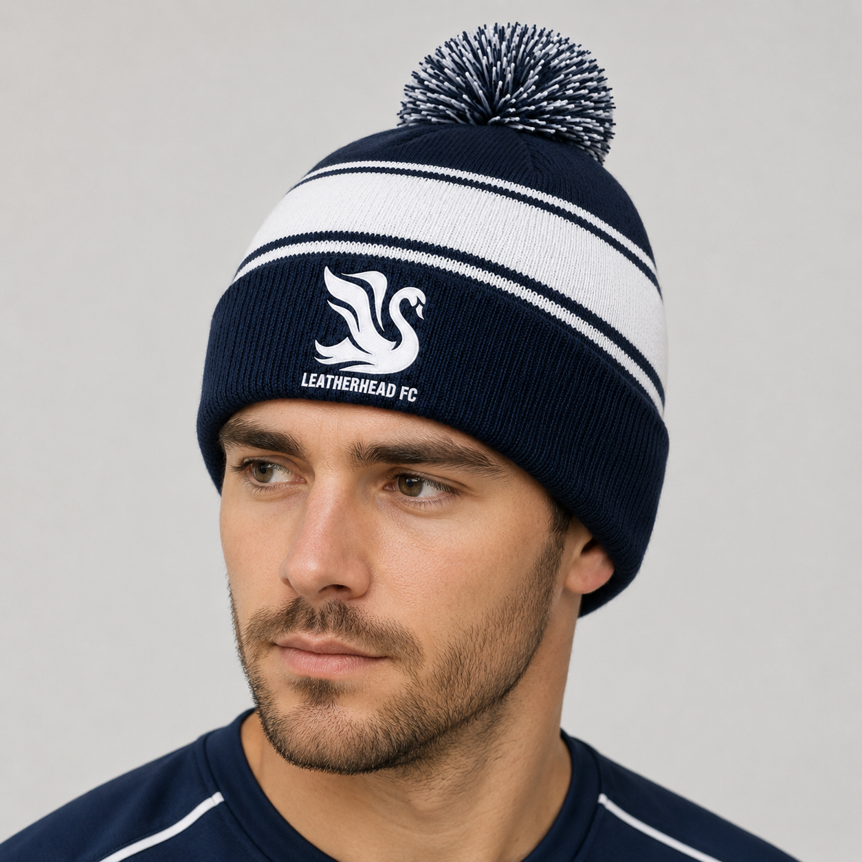 Leatherhead Swan Cuffed Knitted Pom Pom Beanie - Navy
